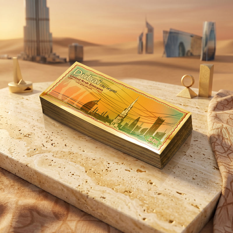Macro detail of 24K gold note showing Dubai skyline etching
