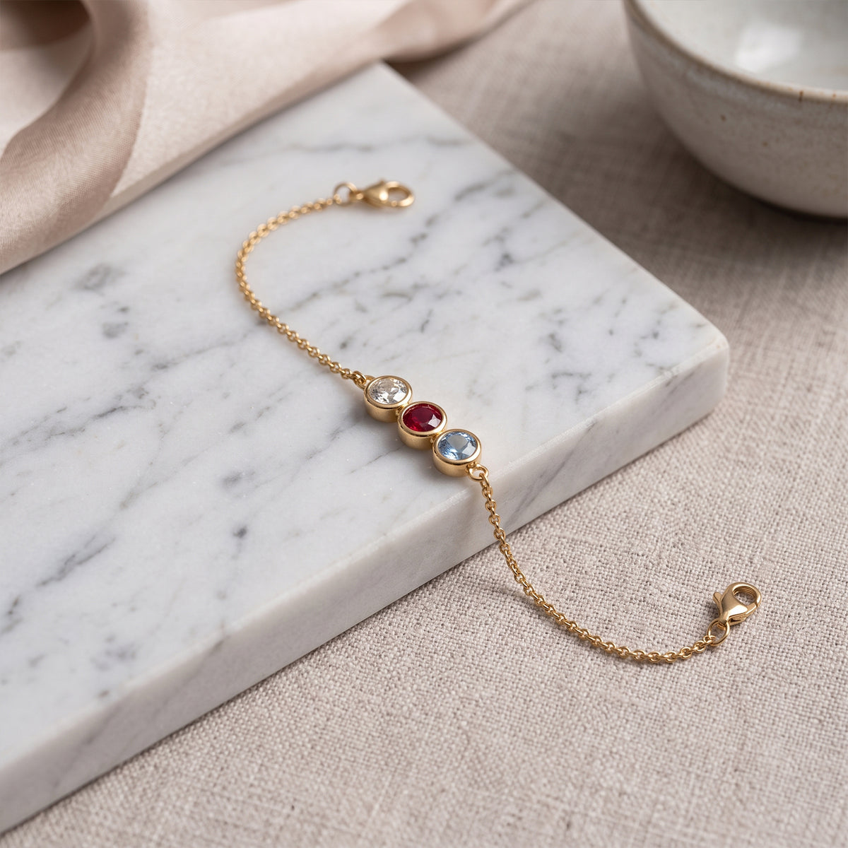 18k Gold Three-Stone Bezel Bracelet | Diamond, Ruby & Aquamarine